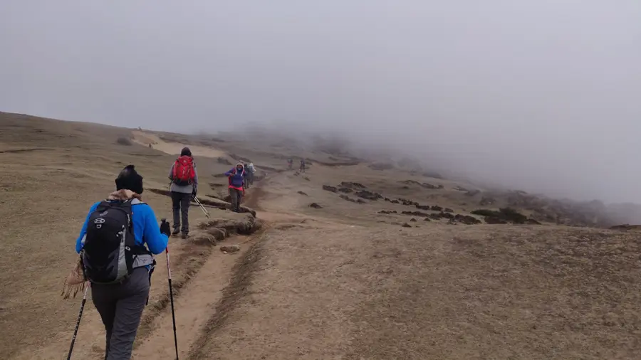 Trekker following a Guide in Everest Trek