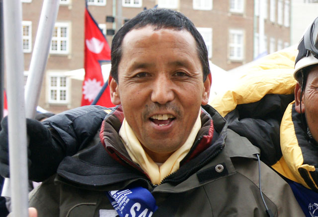 Apa (born Lhakpa Tenzing Sherpa; 20 January 1960),nicknamed "Super Sherpa", is a Nepalese Sherpa mountaineer who, jointly with Phurba Tashi, holds the record for reaching the summit of Mount Everest more times than any other person. As part of The Eco Everest Expedition 2011, Apa made his 21st Mount Everest summit in May 2011.