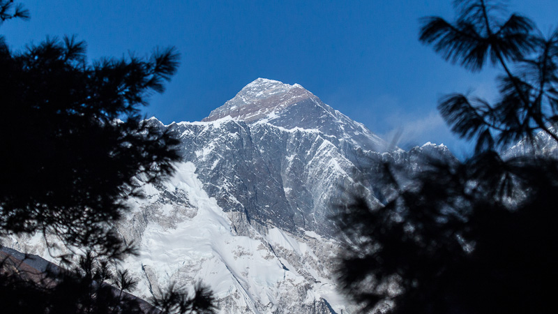 Mount Everest under the clear blue sky.