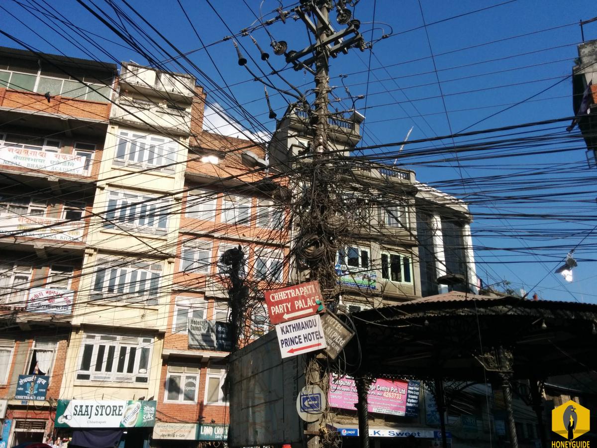 Funny things in Kathmandu. Wires all over the head of the people living in the Kathmandu.