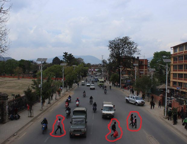 People crossing streets in Nepal